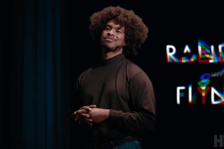 Terence Nash, in a black shirt, giving a technology presentation.